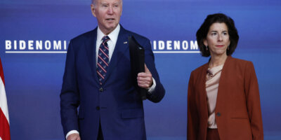 WASHINGTON, DC - OCTOBER 23: U.S. President Joe Biden responds to a question about hostage negotiations with Hamas alongside U.S. Commerce Secretary Gina Raimondo at an event in the South Court Auditorium in the Eisenhower Executive Office Building at the White House on October 23, 2023 in Washington, DC. During the event Biden spoke on how his administration's "Bidenomics" agenda would invest in technology for people in the United States. Anna Moneymaker/Getty Images/AFP (Photo by Anna Moneymaker / GETTY IMAGES NORTH AMERICA / Getty Images via AFP)